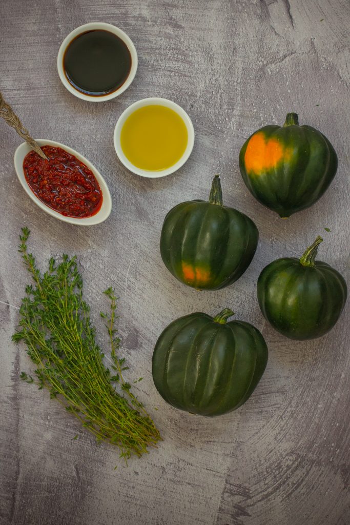 Baked Acorn Squash with Harissa and Date Honey