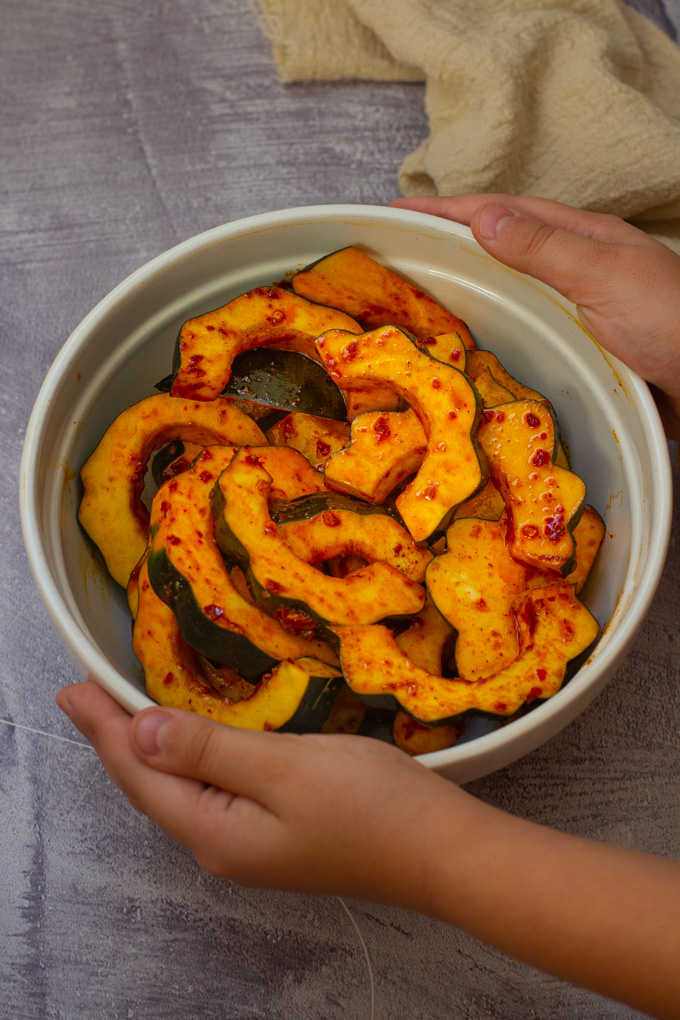 Baked Acorn Squash with Harissa and Date Honey