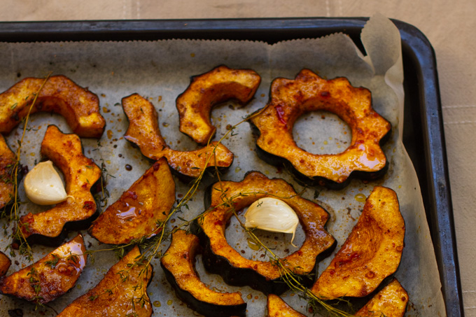 Baked Acorn Squash with Harissa and Date Honey