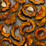 Baked Acorn Squash with Harissa and Date Honey